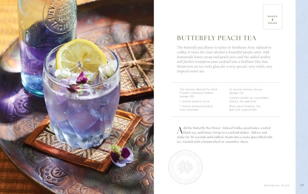 Purple butterfly pea flower cocktail in a glass with a lemon slice and edible flowers on a decorative tray; recipe spread titled Butterfly Peach Tea.