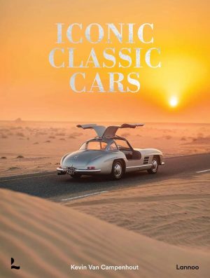Book cover showing a silver classic car with gull-wing doors on a desert road at sunset, titled 'Iconic Classic Cars'.